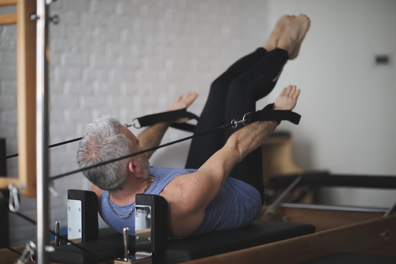 Man pilates reformer exercises